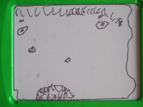むすこが幼稚園の頃に描いた、画面いっぱいの顔